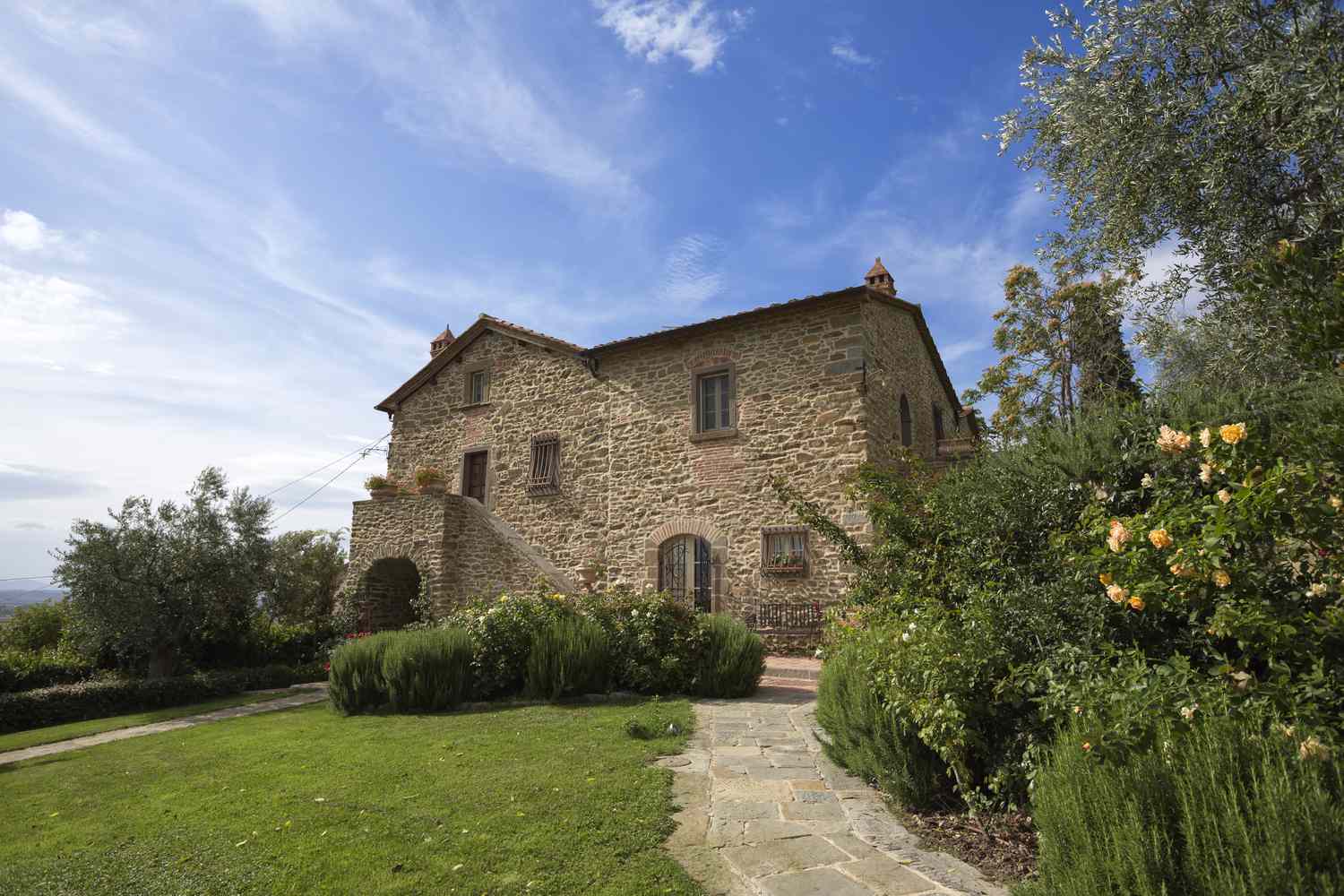 Brick farmhouse style house in Italy.