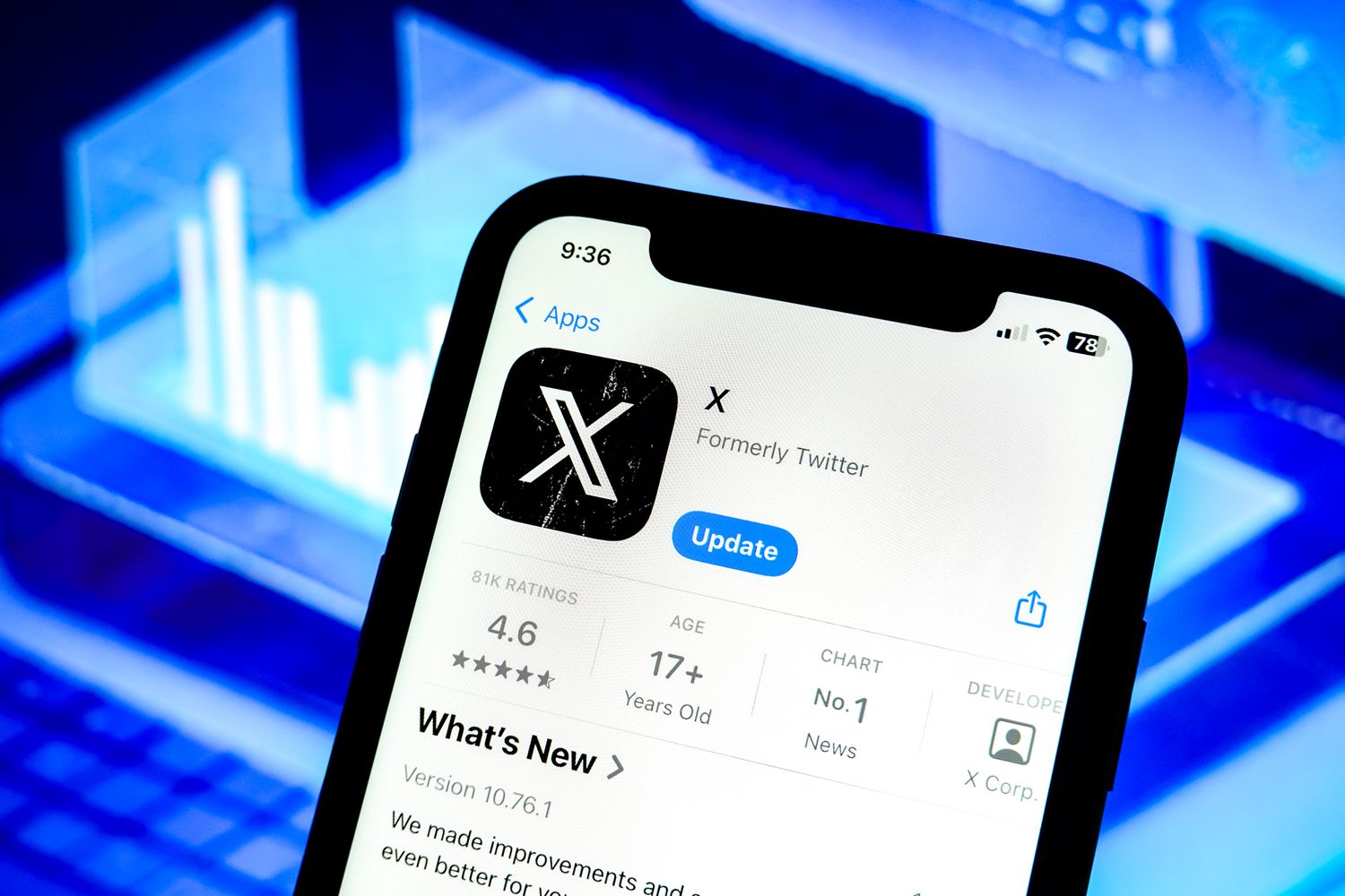 The Apple App store page for X, formerly Twitter, is seen on a phone screen in front of a blue backrgound.