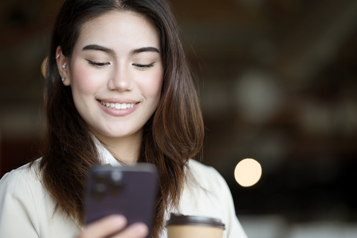 Woman looking at a mobile phone