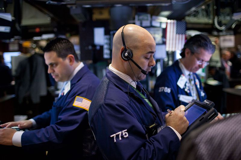 Traders on the floor of the NYSE