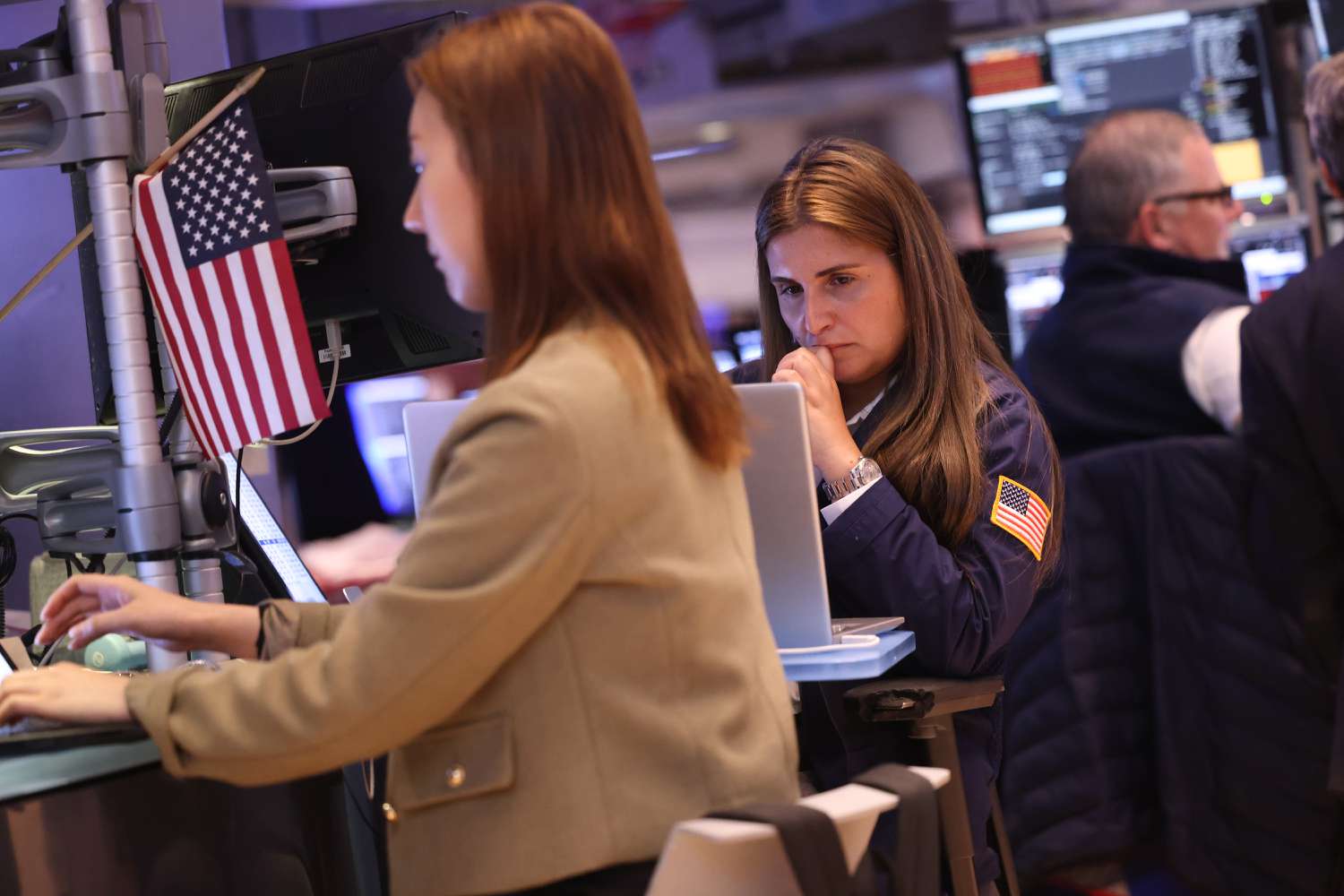 Traders work on the floor of the New York Stock Exchange.