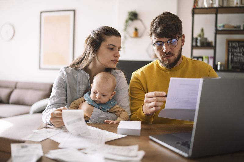 Couple paying their taxes