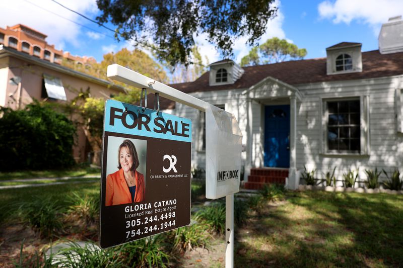 A For Sale sign displayed in front of a home on February 22, 2023 in Miami, Florida.