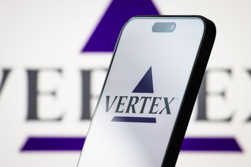 The logo of Vertex Pharmaceuticals Incorporated is displayed on a smartphone screen, with the company's branding visible in the background