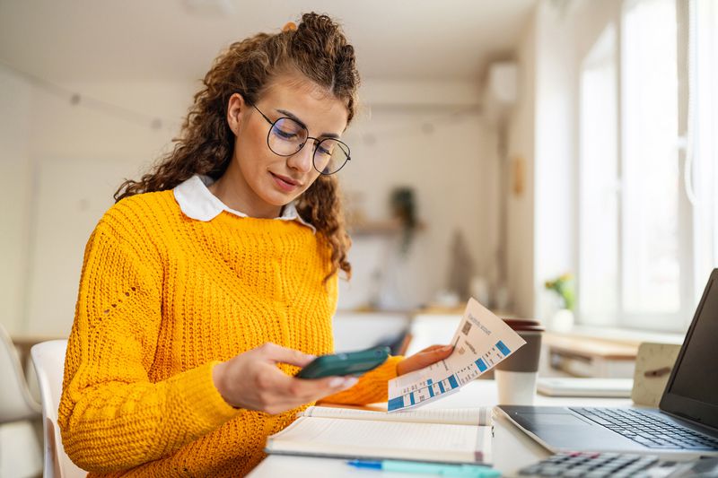 Woman looking at bank statement