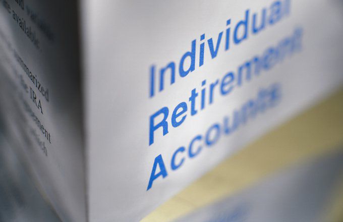 Individual Retirement Accounts written on a paper.