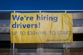 Sign saying Metro Transit is hiring drivers in Maplewood, Minnesota 