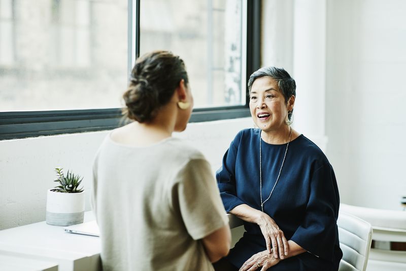 Woman speaks with a credit counselor