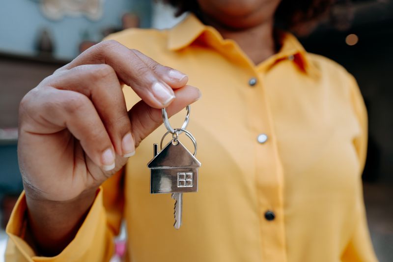 Woman holding house keys