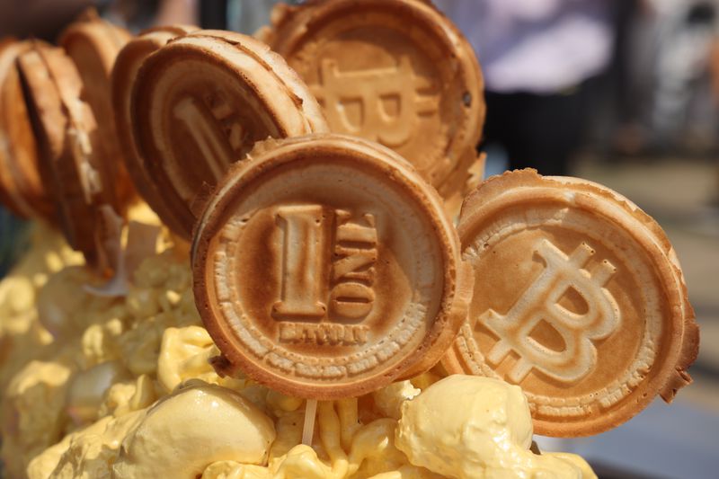 Waffles at a food festival in Toronto in August 2024 depict Bitcoin and other cryptocurrency themes. 