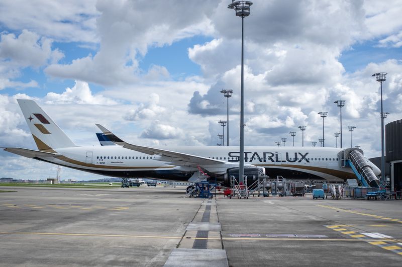 Starlux Airlines plane at Toulouse-Blagnac Airport.