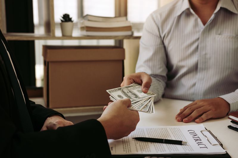A taxpayer receives money after electing to use a refund anticipation loan from the business that completed their tax return. 