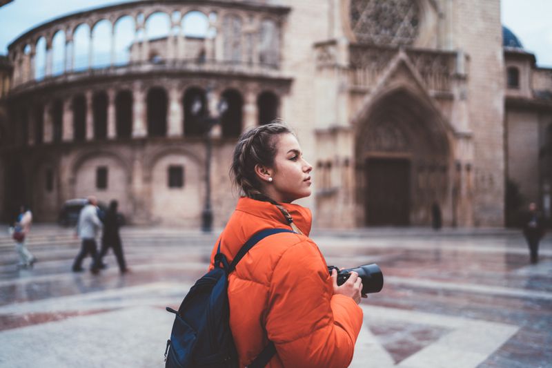 Traveler with camera enjoying Valencia