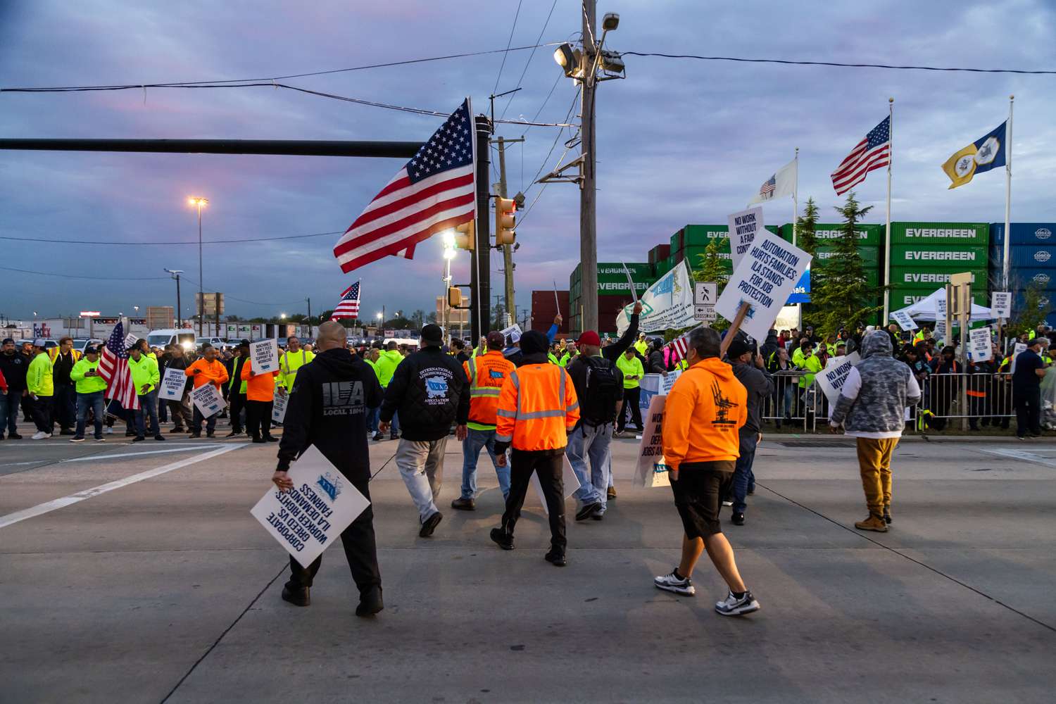Workers picket outside the APM container terminal at the Port of Newark in Newark, New Jersey on Oct. 1, 2024