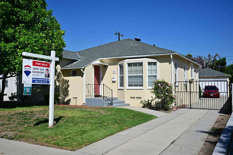 A "for sale" sign is posted in front of a home for sale in San Marino, California on September 6, 2023. With US mortgage rates rising to 15-year highs hovering around 7.2% to start the post-Labor Day period, the difference between new 30-year home loan rates and on all outstanding US mortgage debt has not been this wide since the 1980s. 