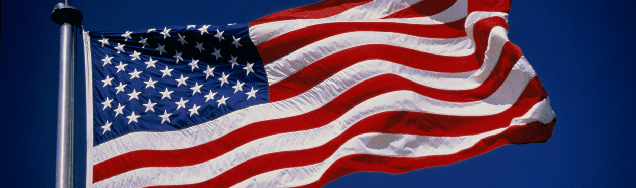 The American flag waving in the breeze