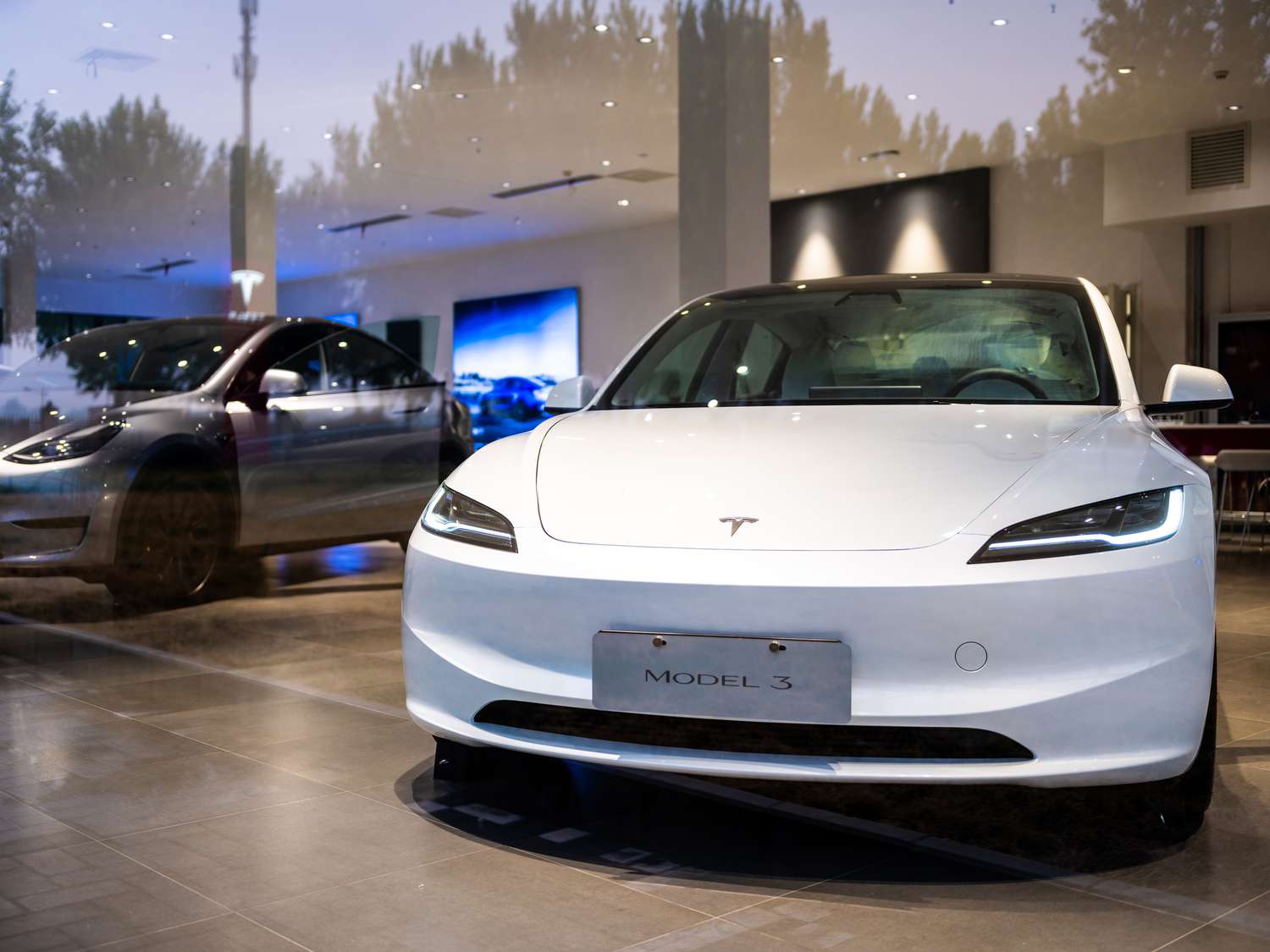 A Tesla Inc. Model 3 electric vehicle at a store in Beijing, China, on Monday, April 22, 2024. 