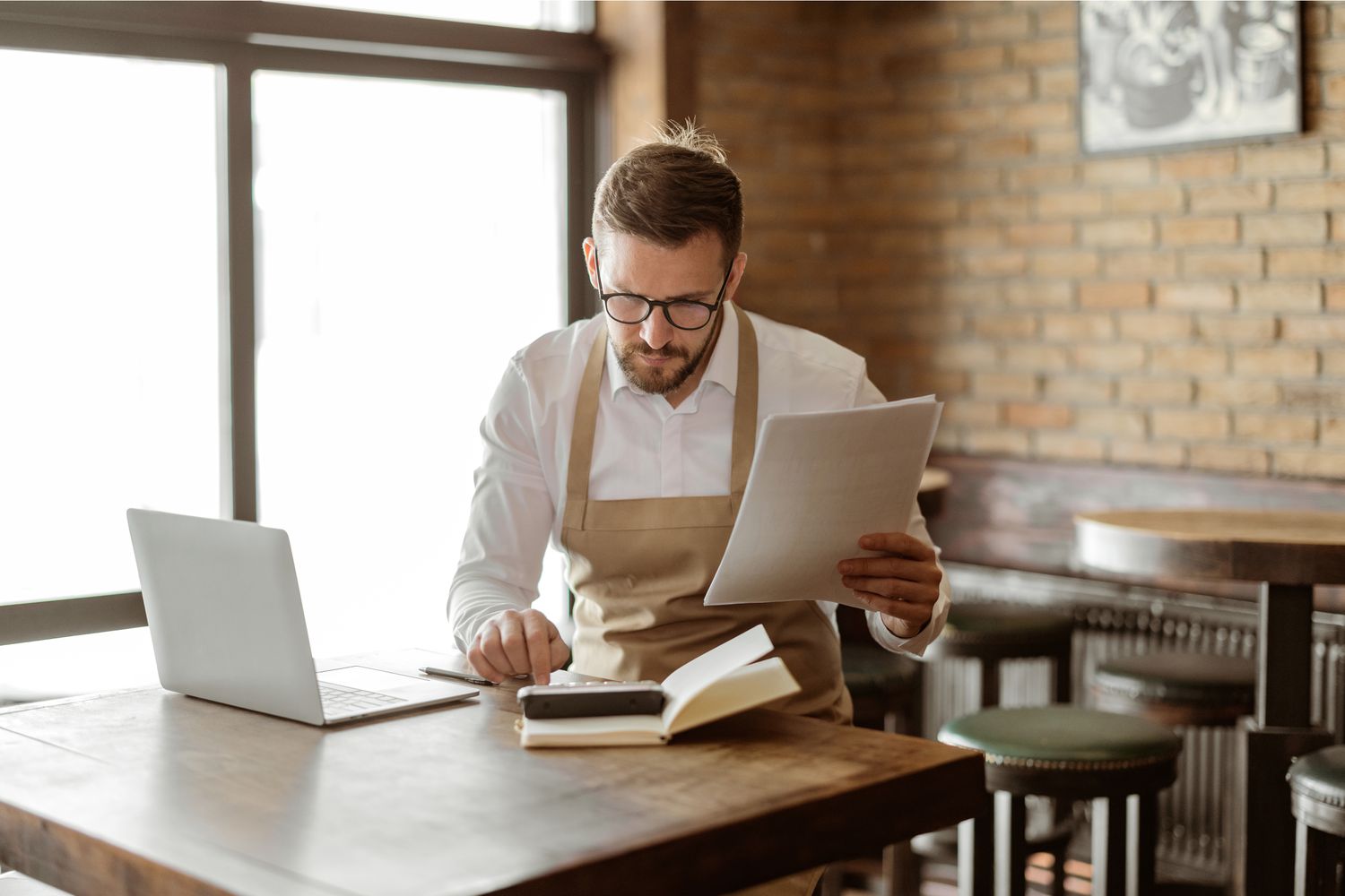 Business owner prepares documents to apply for a swingline loan.