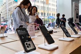 An iPhone 16 display in an Apple store 
