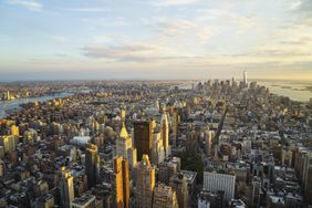New York City skyline looking south towards Lower Manhattan at sunset.