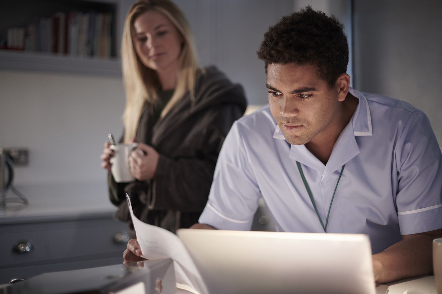 Student reading on his computer if private loans will be a better option if the education department closes