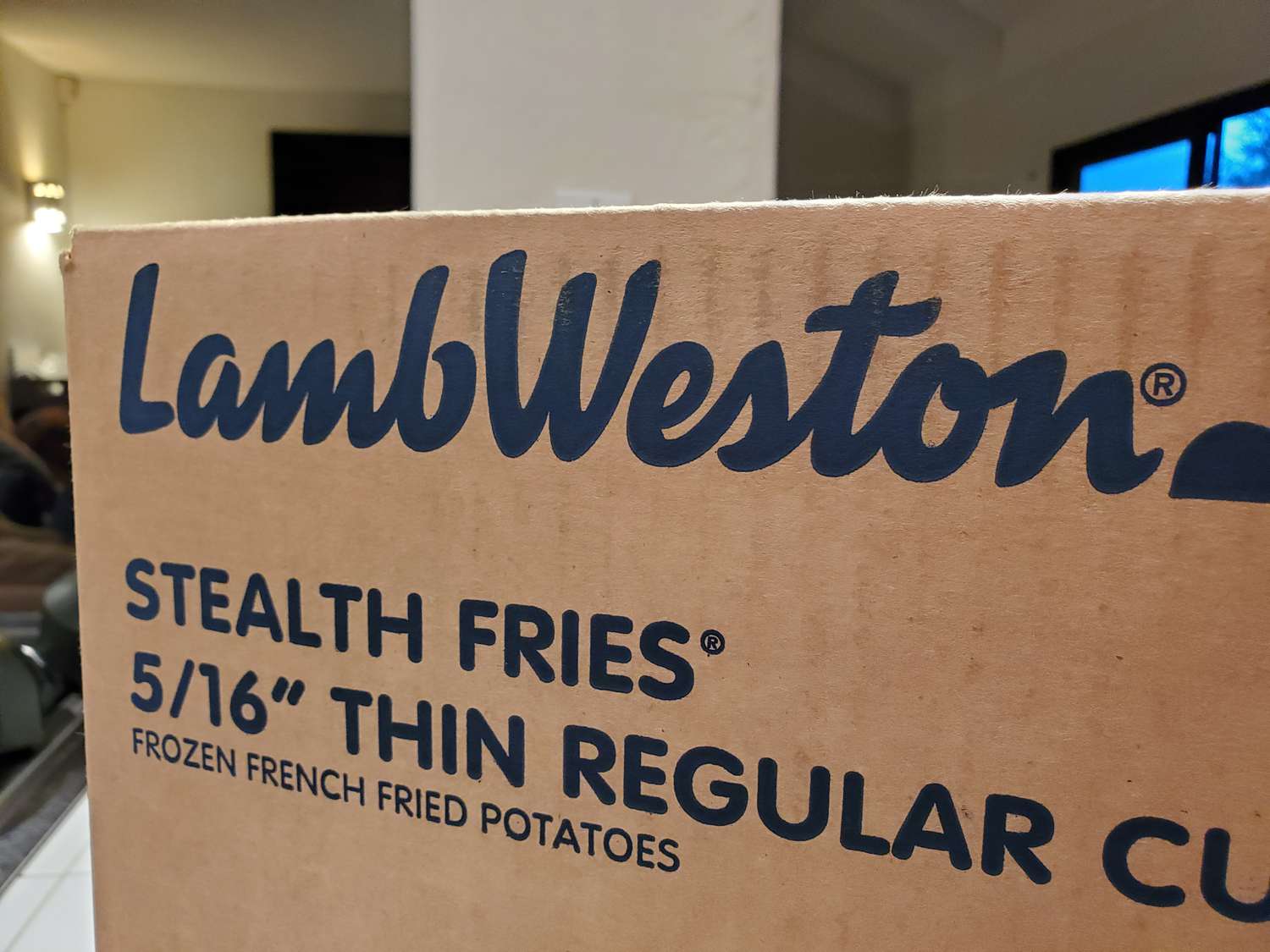 A logo for Lamb Weston, frozen potato products company, printed on a Stealth Fries pack