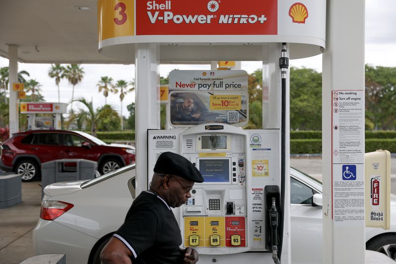 Patrick Patterson walks to his vehicle after pumping gas at a Shell station on April 10, 2025 in Miami, Florida.