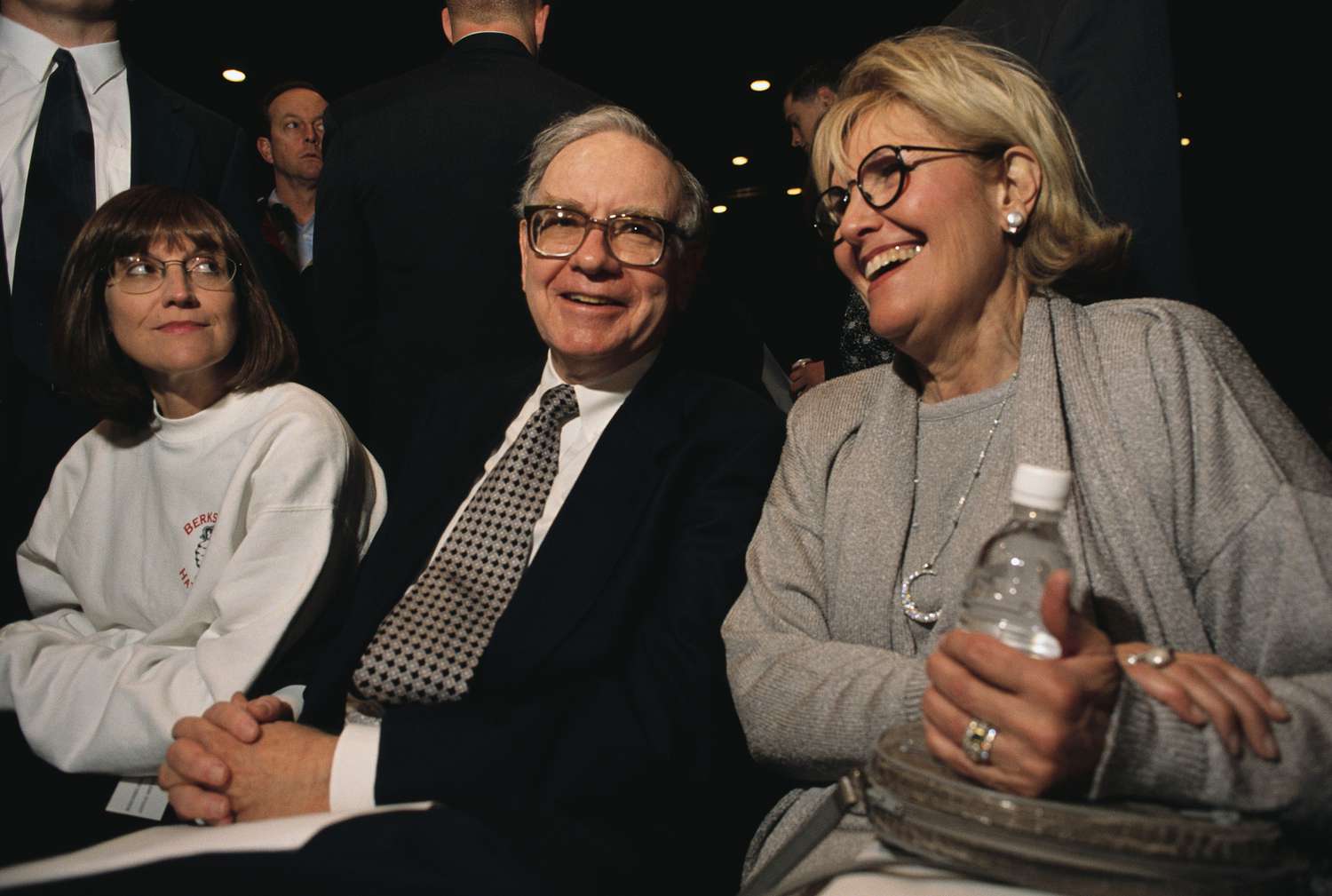 Warren Buffett, CEO of Berkshire Hathaway, attends the company's annual shareholders' meeting with his daughter (left) and his wife, both named Susan.