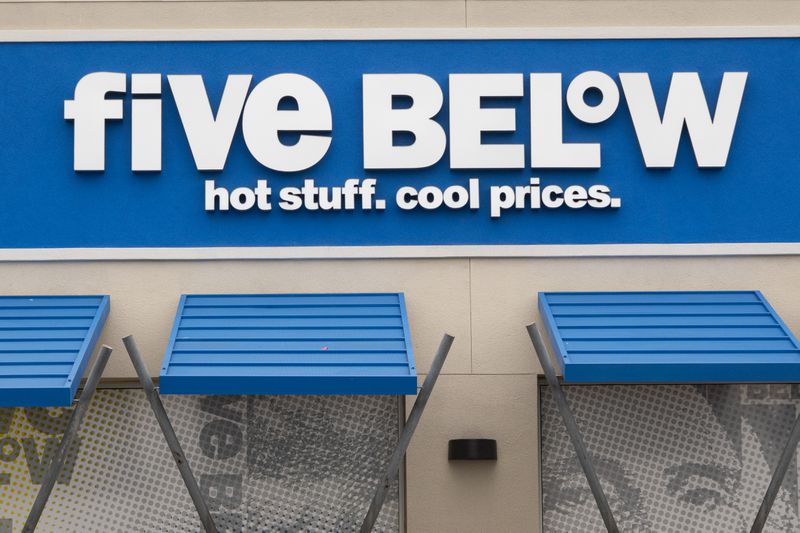 The Five Below corporate logo is displayed on a sign at their outlet store on January 31, 2025 in San Diego, California