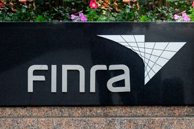 An outdoor sign that says FINRA