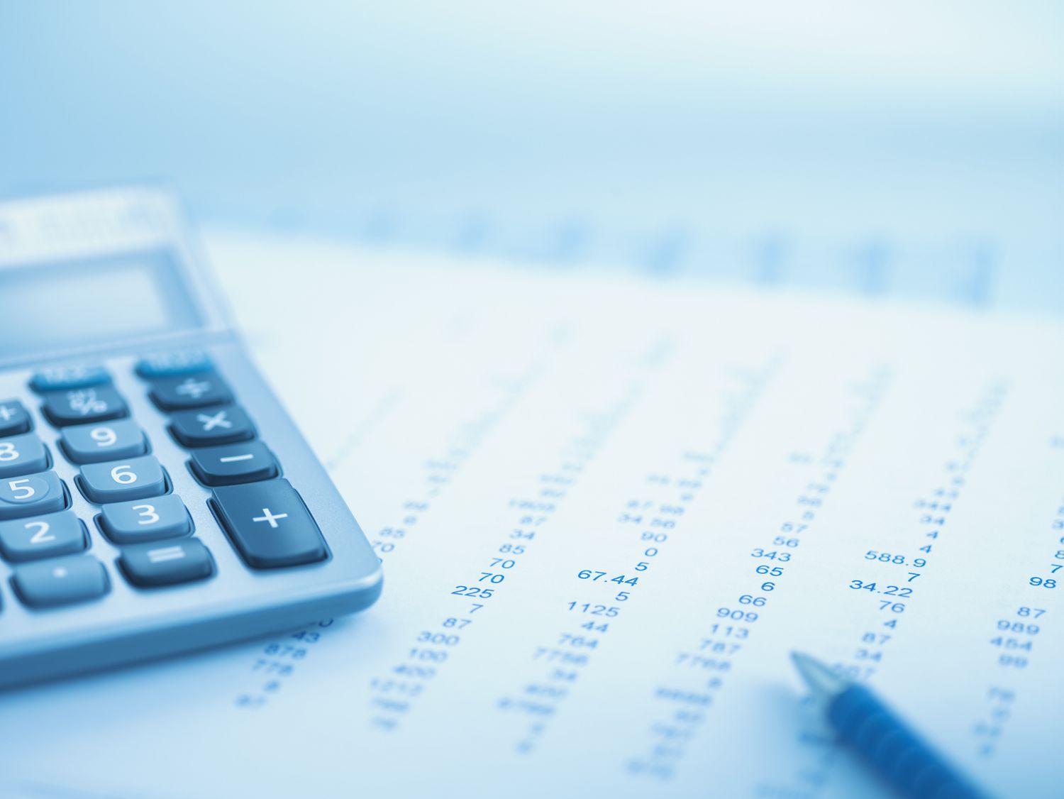 Close-up of calculator and data