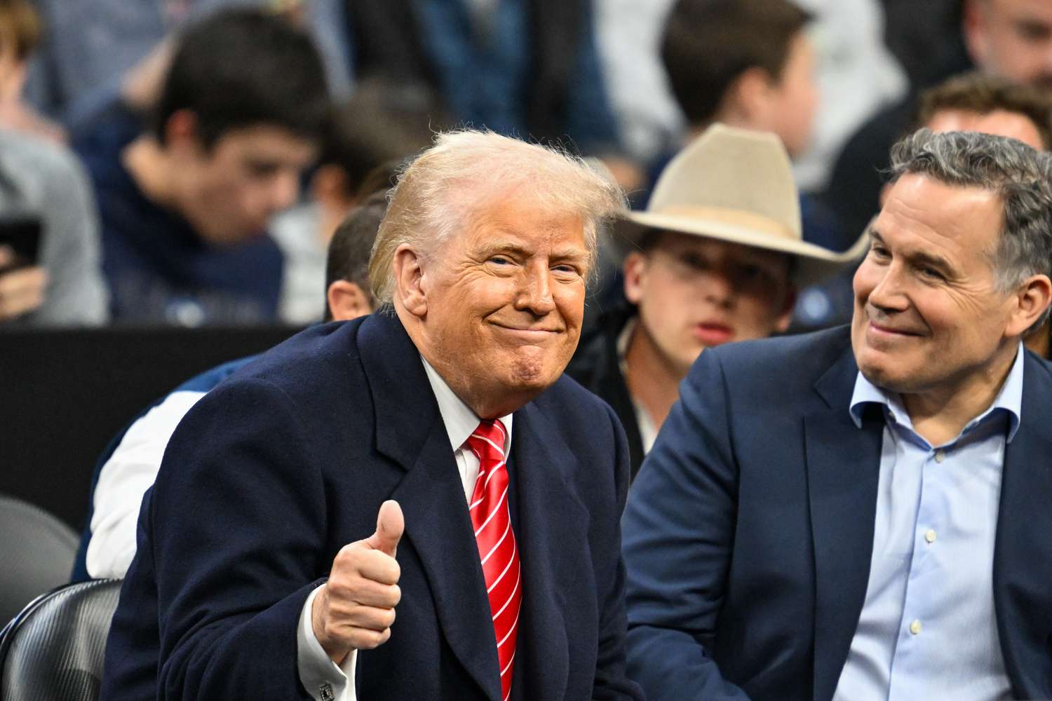 President Donald Trump and Pennsylvania Senator David McCormick enjoy the matches during the NCAA Division 1 wrestling national championship finals on March 22nd, 2025 at the Wells Fargo Center in Philadelphia, PA.