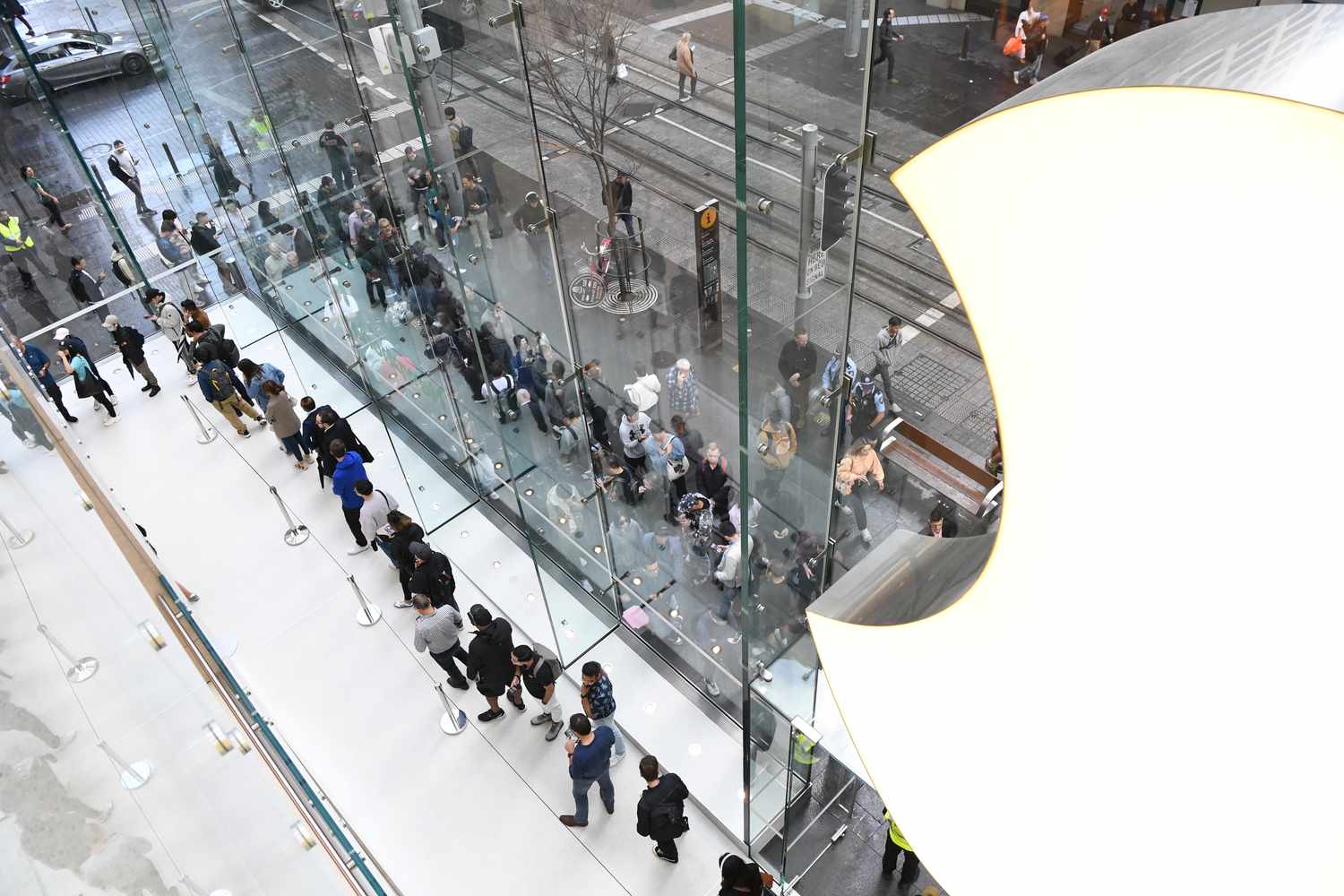Customers wait in line at the Australian release of the latest iPhone and Apple Watch models at the Apple Store on September 22, 2023 in Sydney, Australia