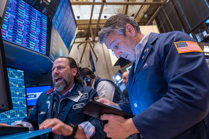 raders work on the floor of the New York Stock Exchange (NYSE) on April 04, 2025 in New York City. 