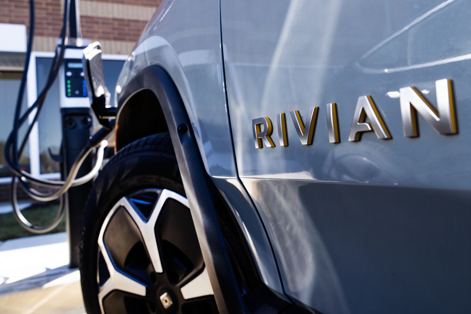 A Rivian vehicle charges 