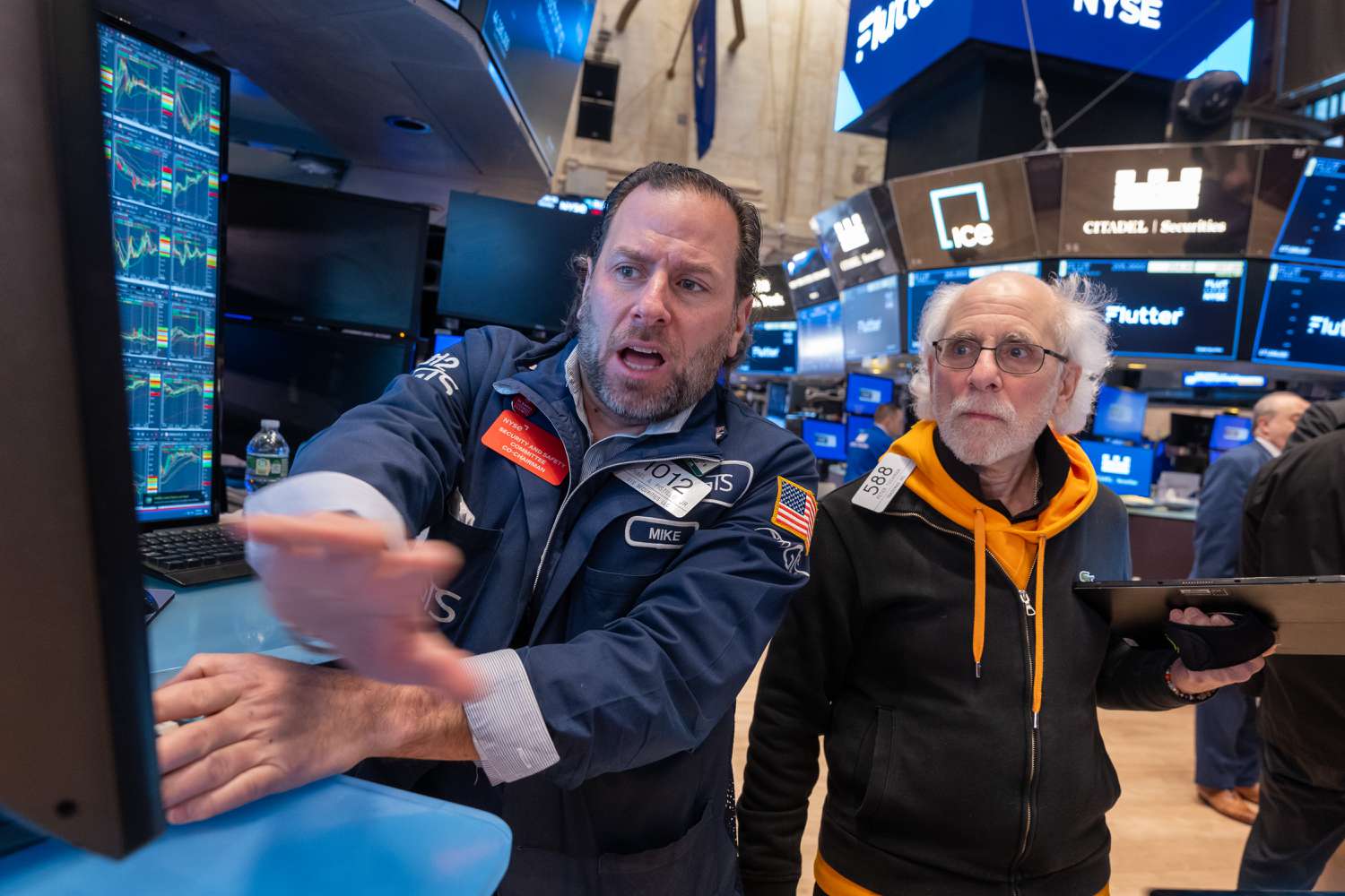 Traders work on the floor of the New York Stock Exchange (NYSE) on January 29, 2024.