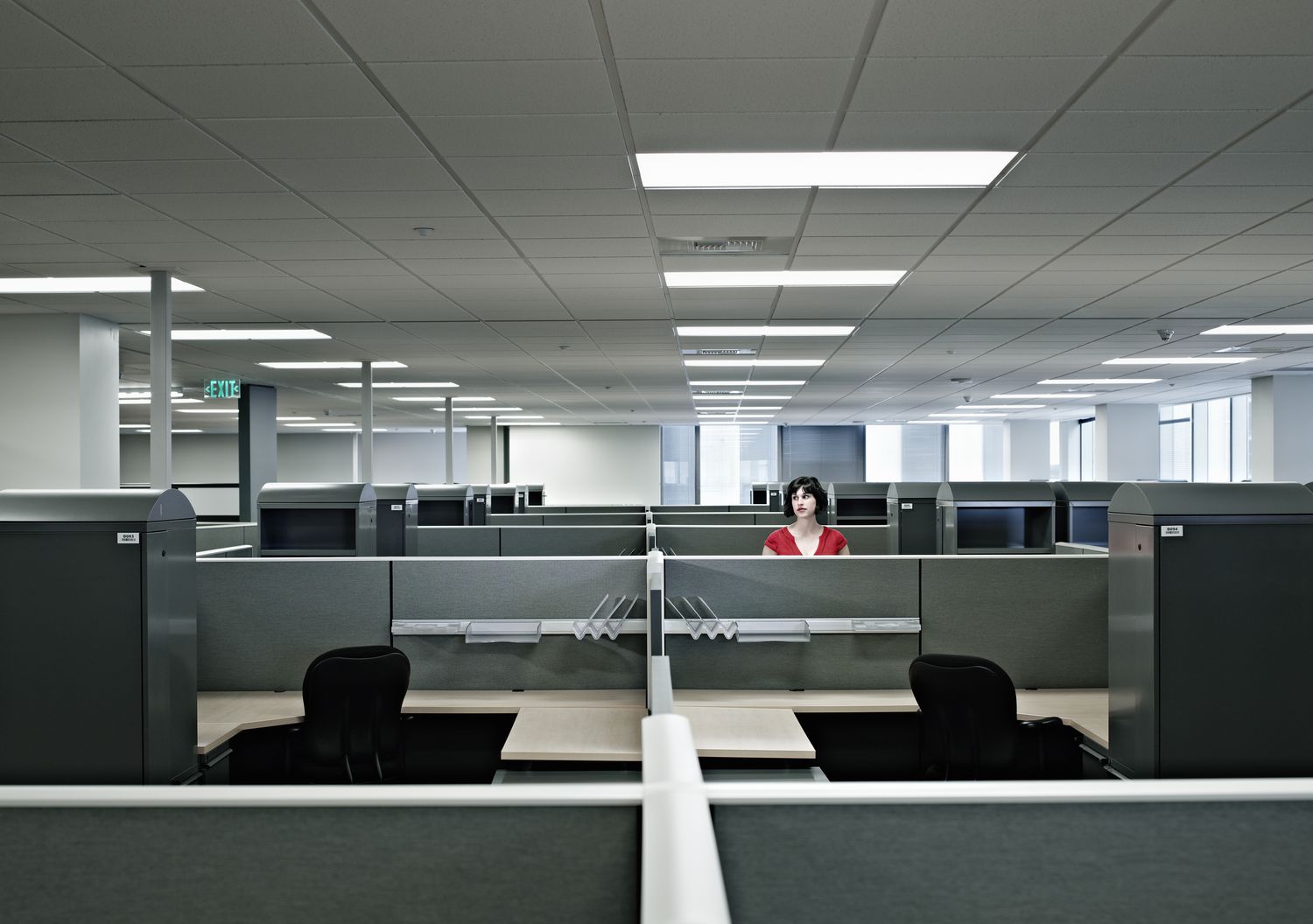 Woman alone in empty office