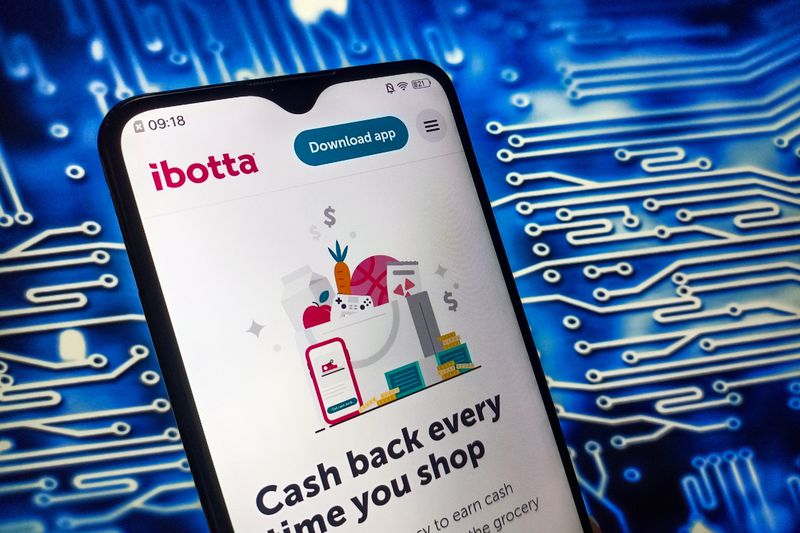 The Ibotta site on a phone screen.