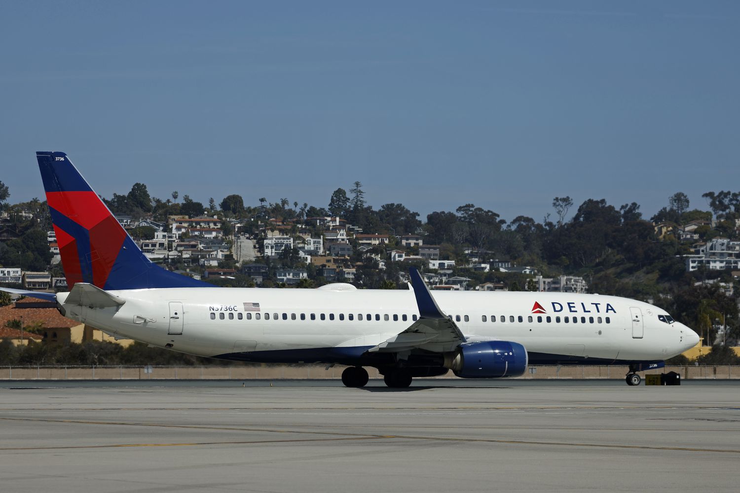 A Delta Airlines Boeing 737-832 taxis at San Diego International Airport before departing for Seattle on March 4, 2025 in San Diego, California