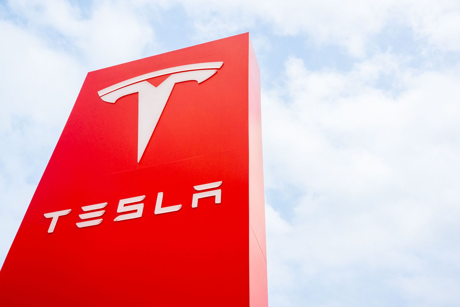 Tesla logo on a dealership sign in Austin, Texas