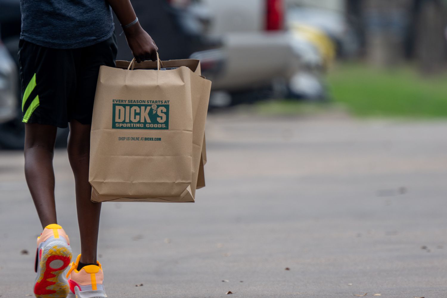 A customer exits a Dick's Sporting Goods.