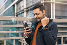 man looking at phone