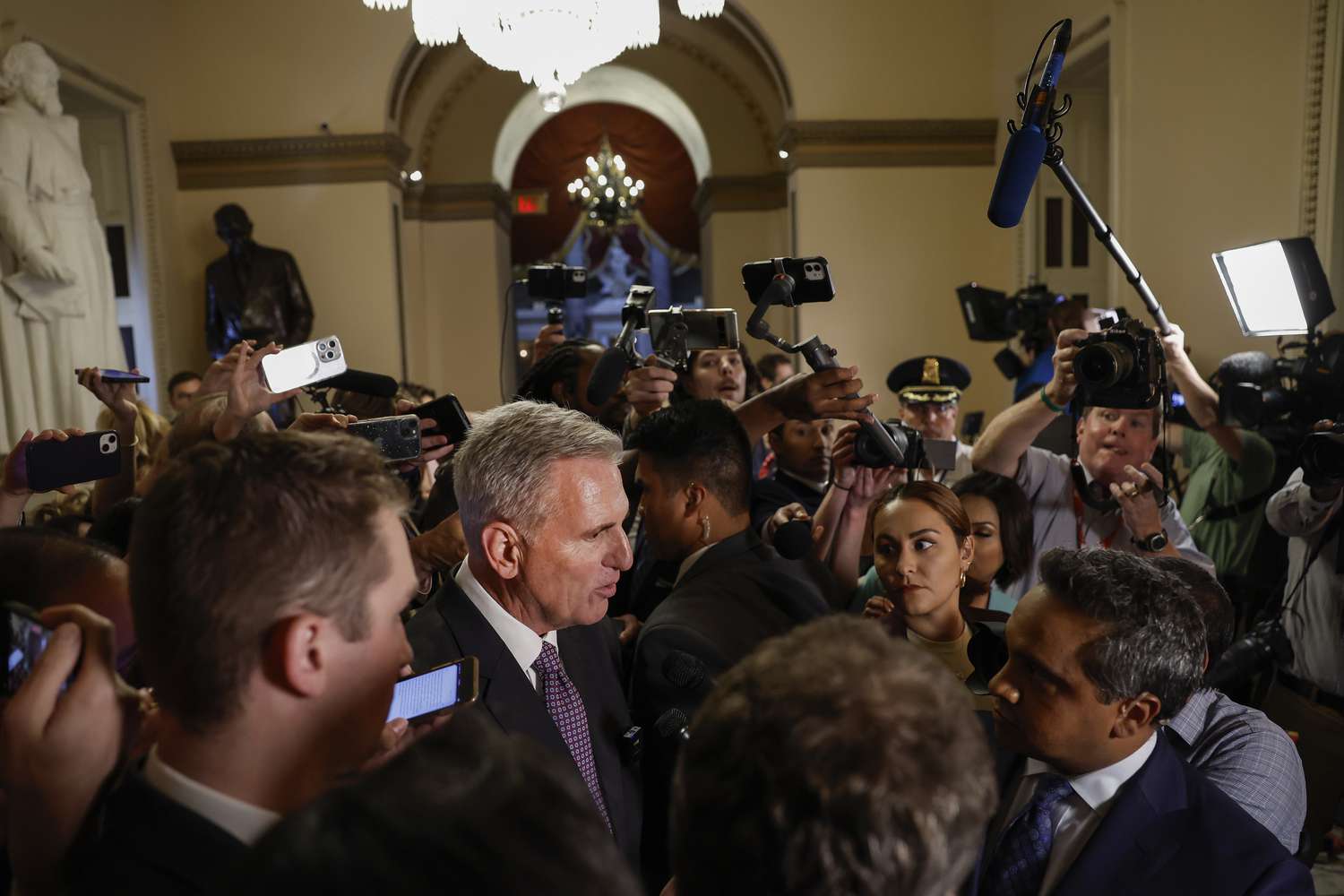 U.S. Speaker of the House Kevin McCarthy (R-CA) speaks to reporters as he walks off the floor of the House Chambers on May 31, 2023 in Washington, DC