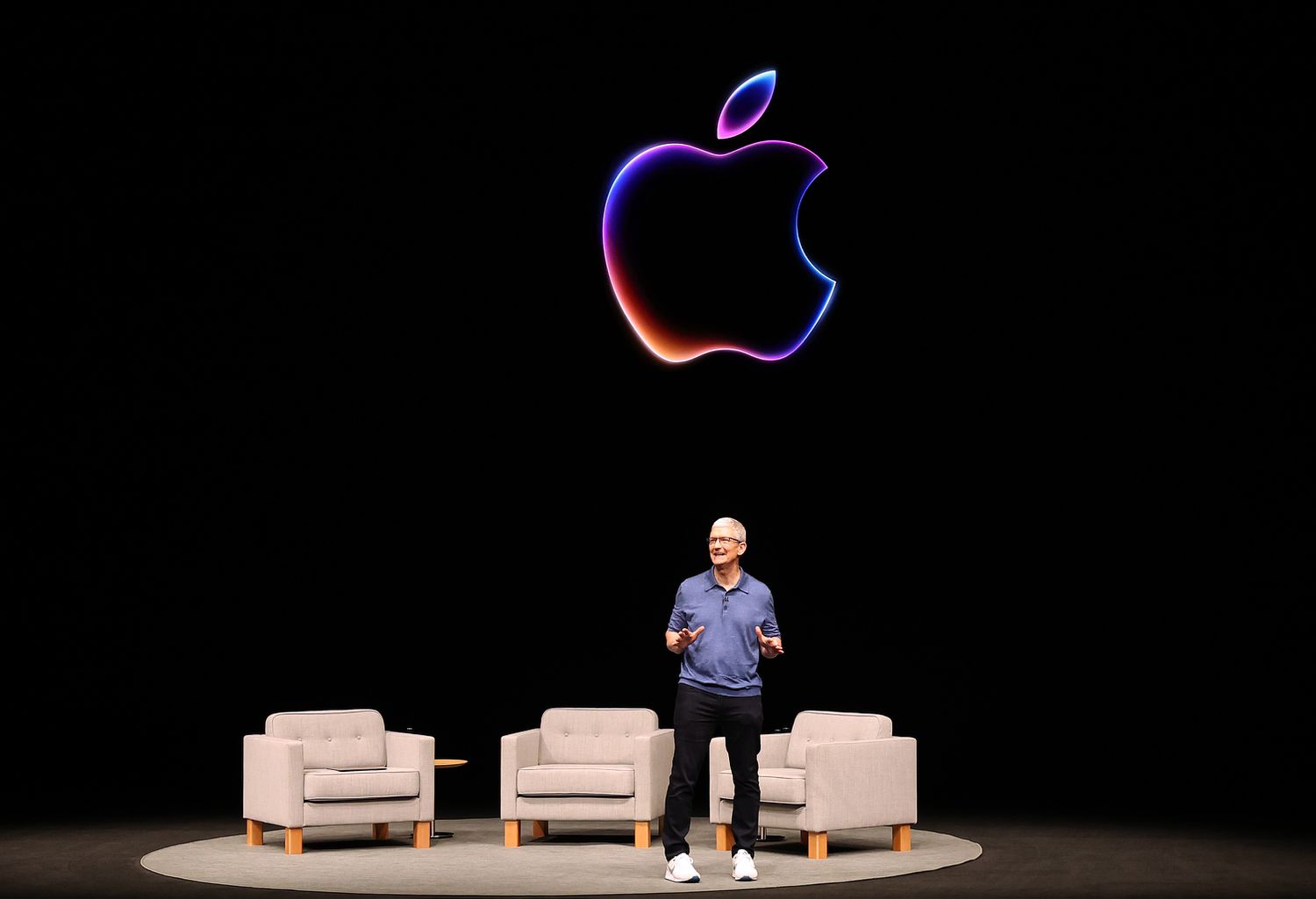 Apple CEO Tim Cook delivers remarks at the start of the Apple Worldwide Developers Conference (WWDC) on June 10, 2024
