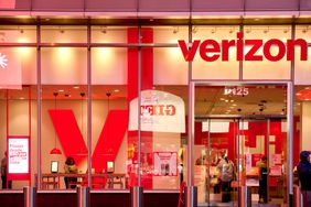 A Verizon store in New York City with a large red "V" on the left wall.