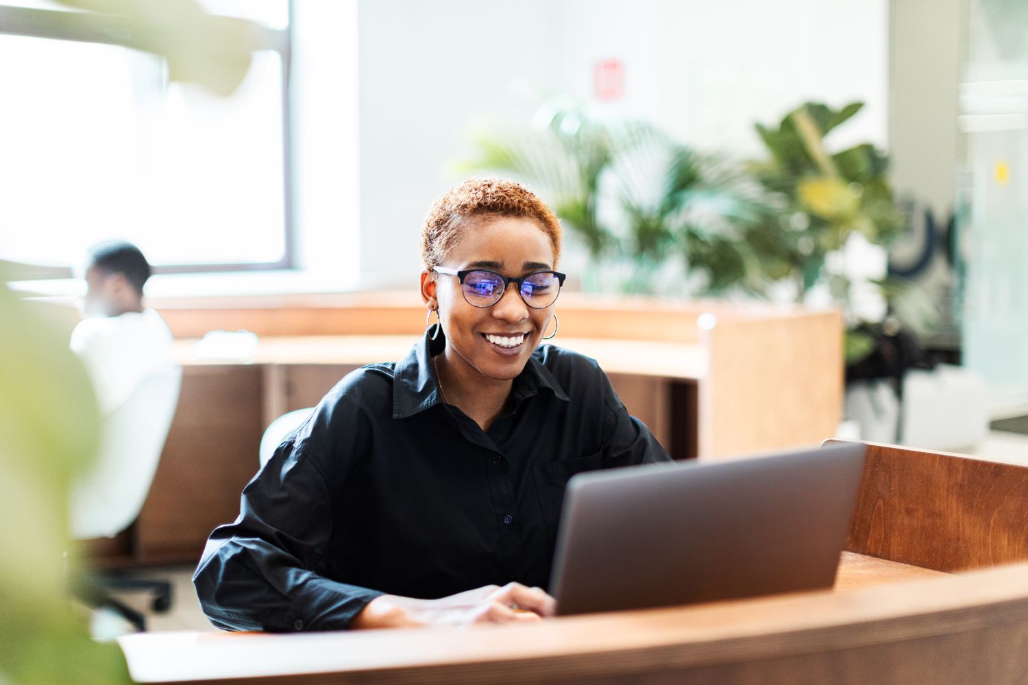 Worker with a computer in an office