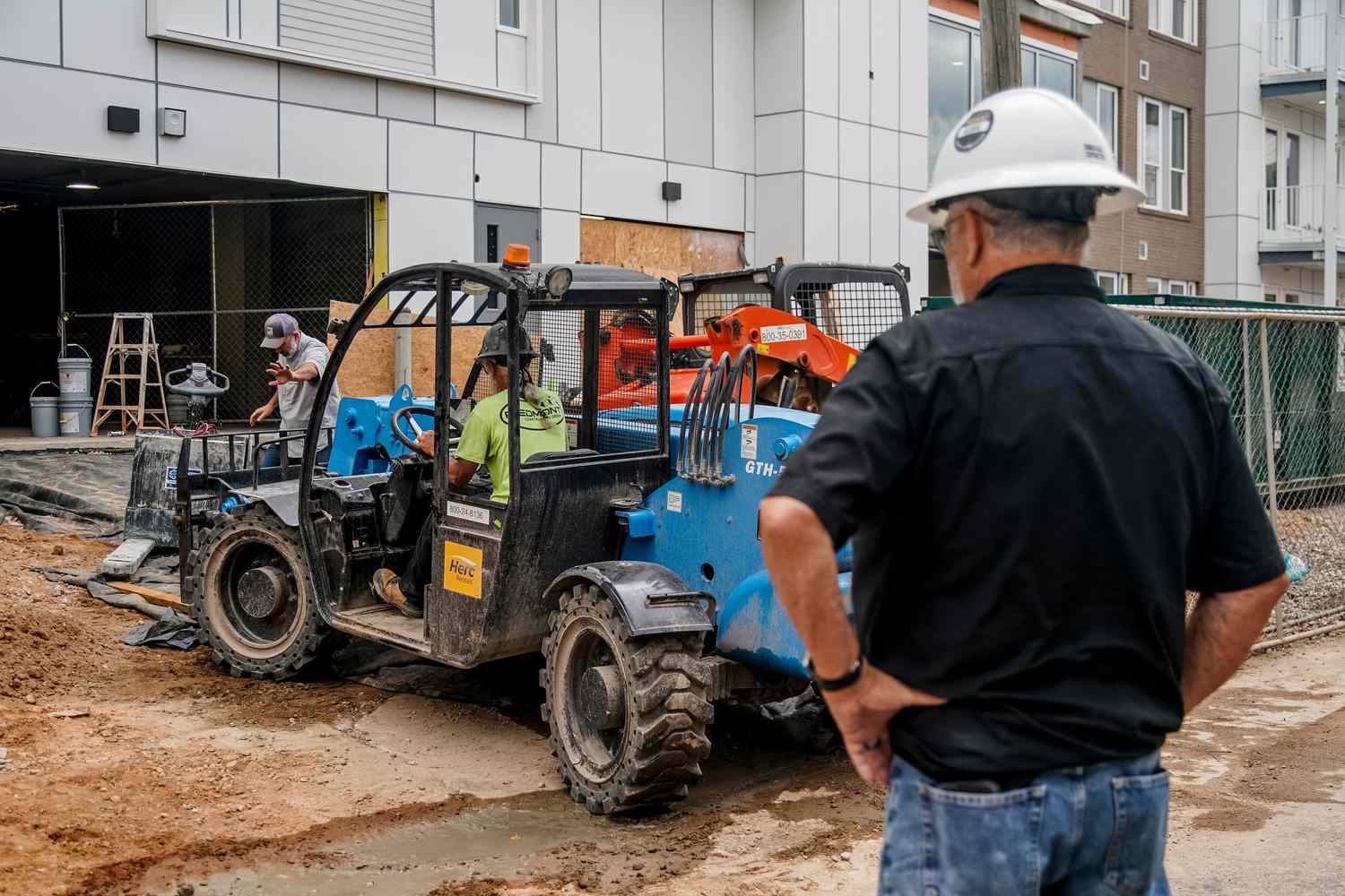 Construction workers build a new apartment complex in Atlanta, Georgia, US, on Monday, Sept. 16, 2024.