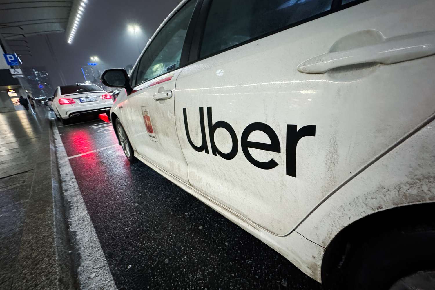 Uber logo is seen on a car in Warsaw, Poland on January 13, 2024