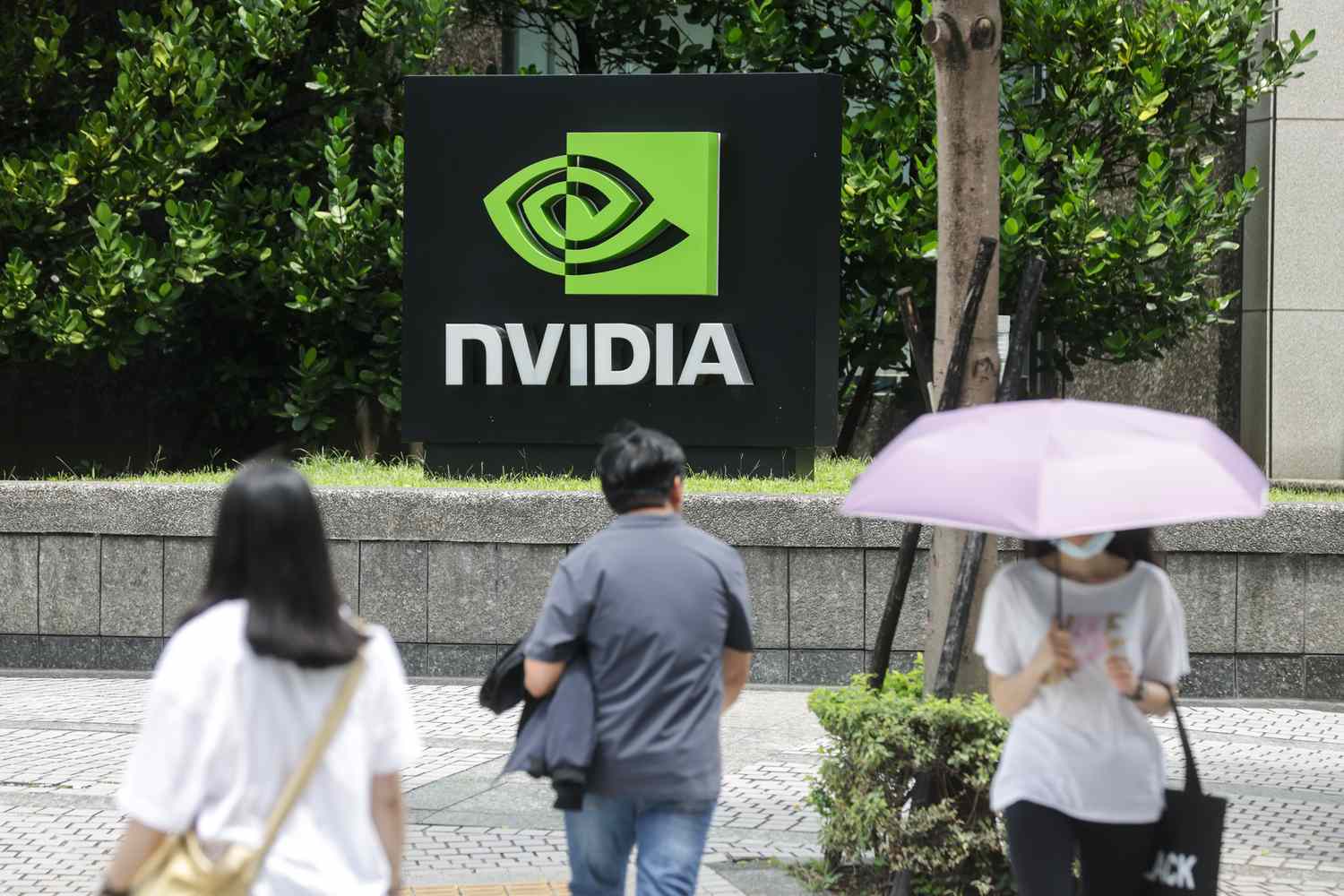 People walk past a Nvidia office in Taipei, Taiwan. 