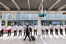 Air Canada pilots picket at Toronto Pearson Airport in Toronto, Ontario, Canada, on Tuesday, Aug. 27, 2024